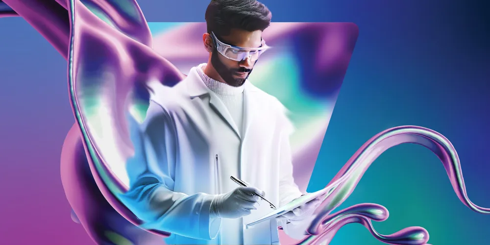 Alt text: A Man with short dark hair in a white lab coat stands confidently against a vibrant, abstract background with flowing shapes in blue, purple, green and white.